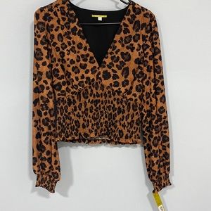 Women’s leopard or cheetah print top